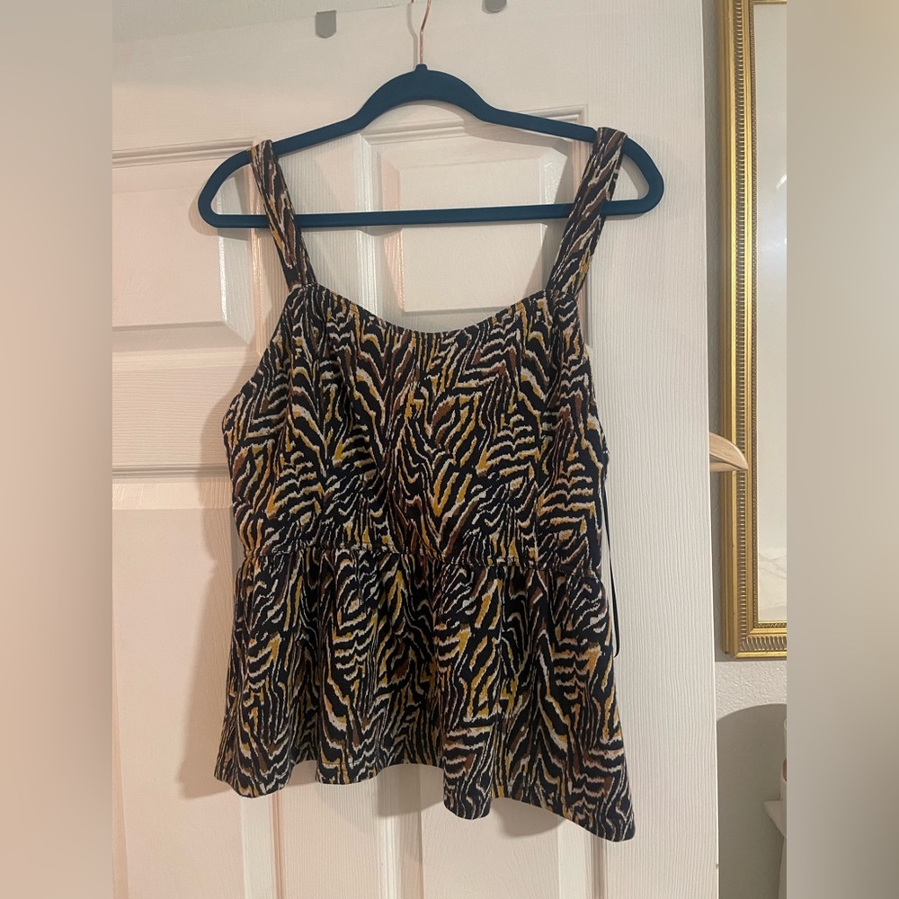 Very pretty Anthropologie tank blouse, peplum style.